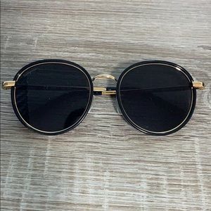 Sunglasses. Black and gold.